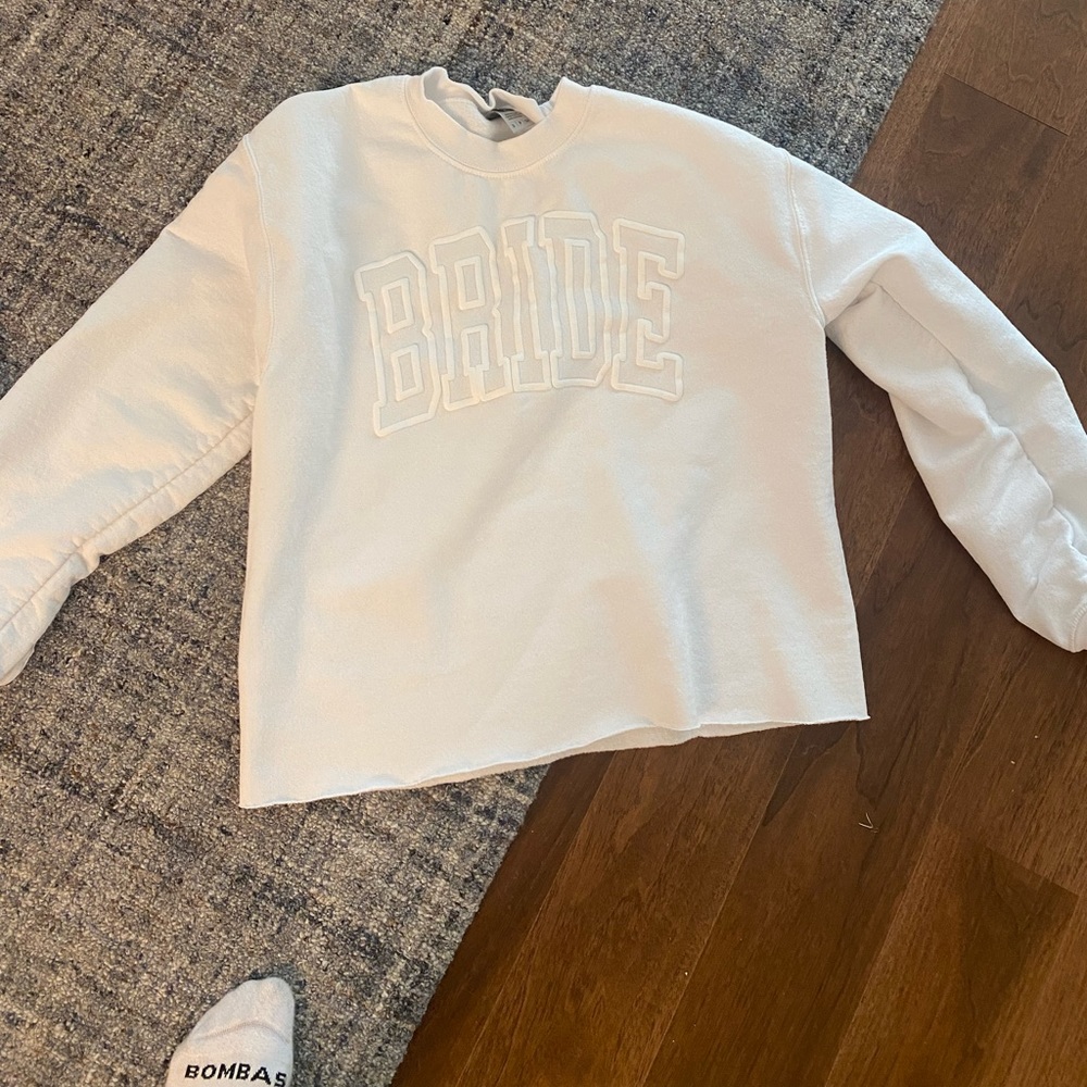 Gildan size small white sweatshirt with BRIDE letters band on bottom cut off